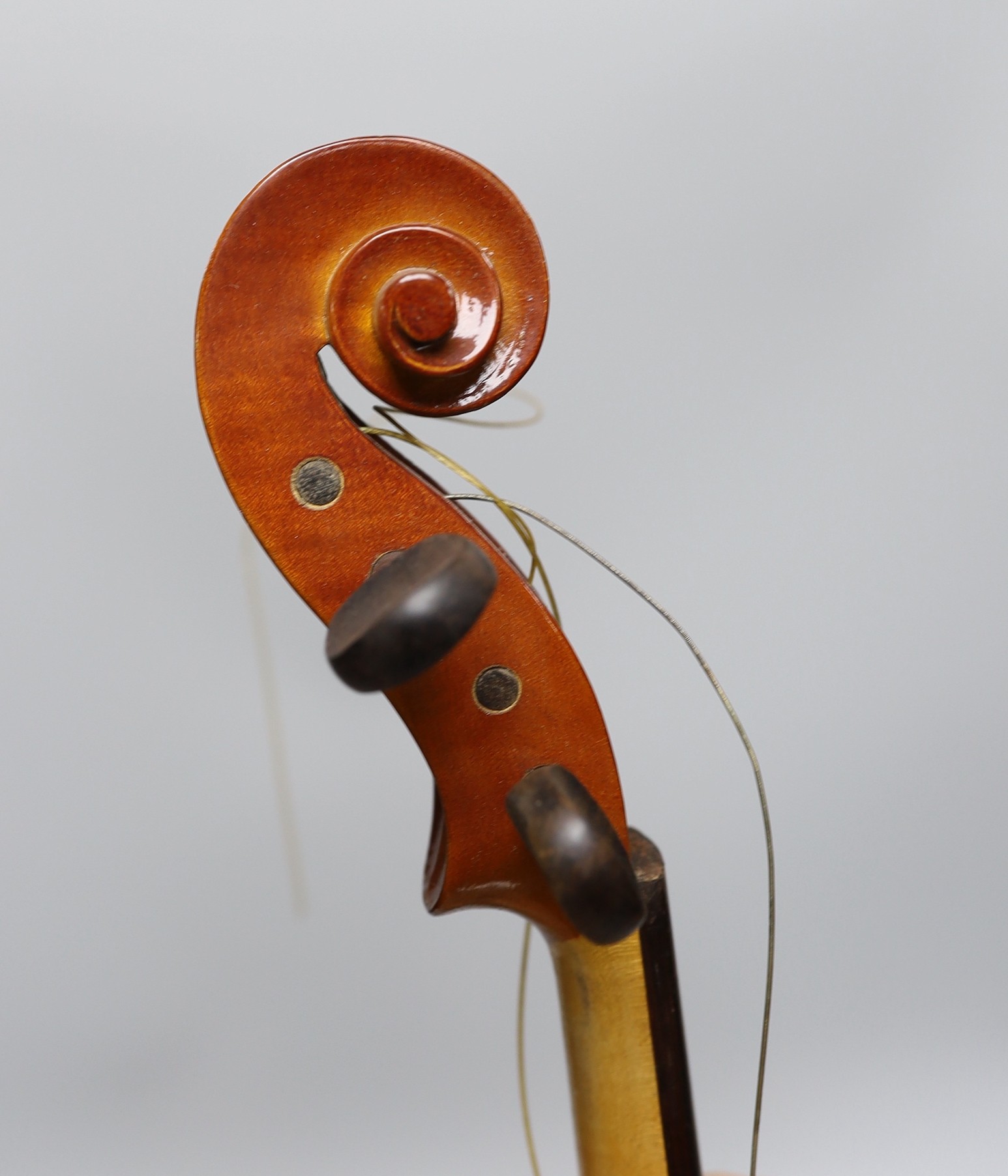 A cased viola and bow, viola back measures, 40.5cm